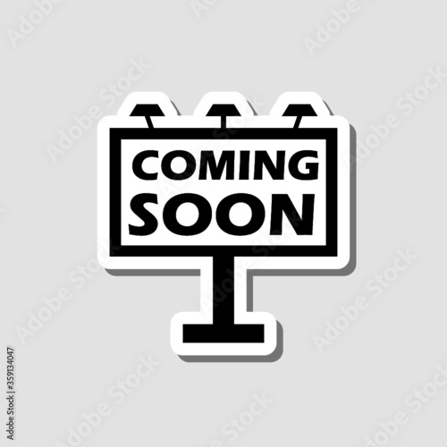 Coming Soon on a large outdoor billboard sticker isolated on gray background