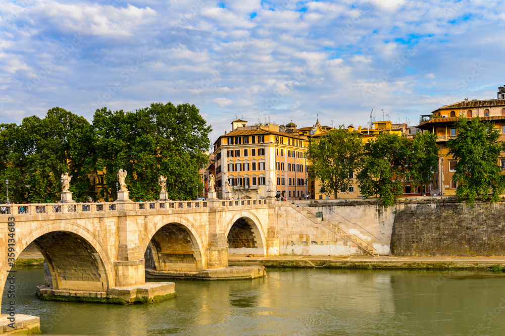 It's Angels Bridge in the Historic Center of Rome, Italy. Rome is the capital of Italy and a popular touristic destination It's Angels Bridge in the Historic Center of Rome, Italy. Rome is the capital of Italy and a popular touristic destination