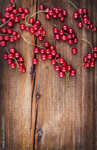  Red Currants on wooden background