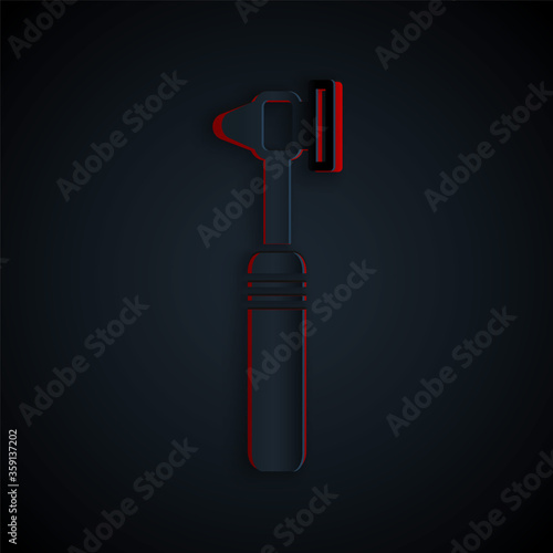 Paper cut Medical otoscope tool icon isolated on black background. Medical instrument. Paper art style. Vector Illustration