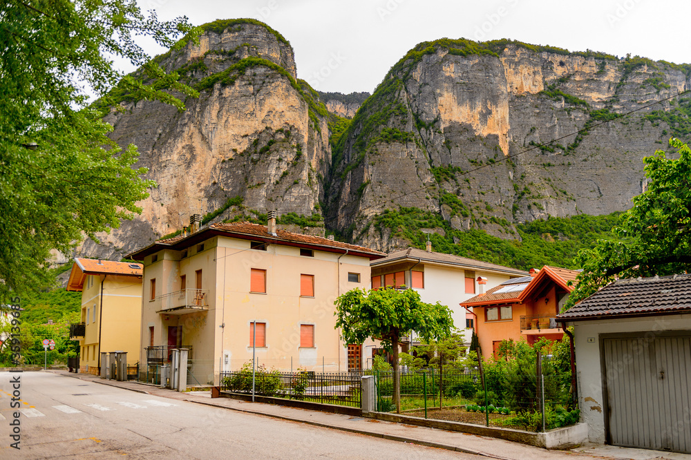 It's Alps mountains and Architecture of Mezzocorona, Italy. A comune in Trentino in the northern Italian region Trentino-Alto Adige, Sudtirol It's Alps mountains and Architecture of Mezzocorona, Italy. A comune in Trentino in the northern Italian region Trentino-Alto Adige, Sudtirol