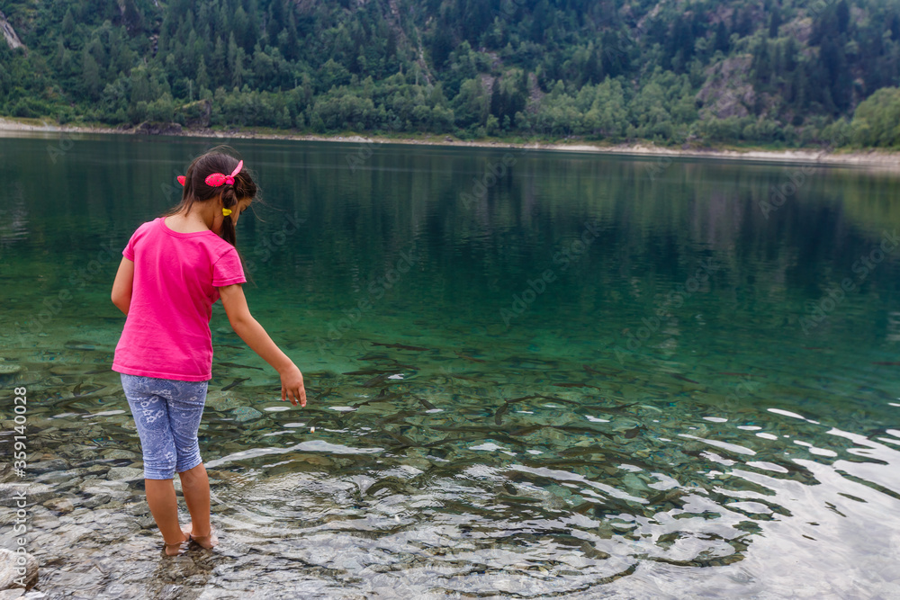 little girl looking to italy mountains little girl looking to italy mountains
