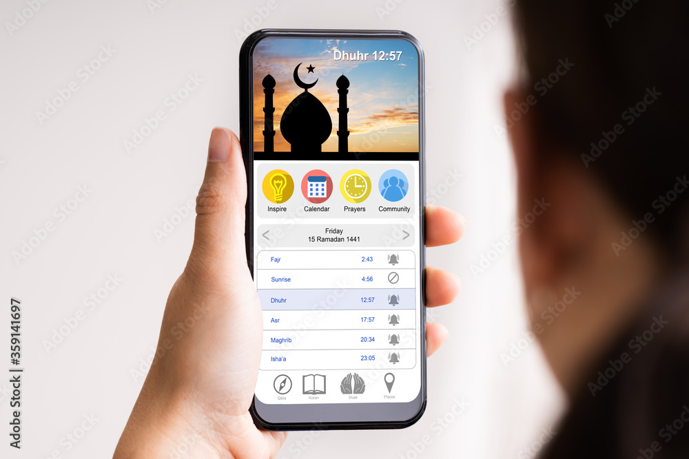 Smartphone App In Hand To Pray Online