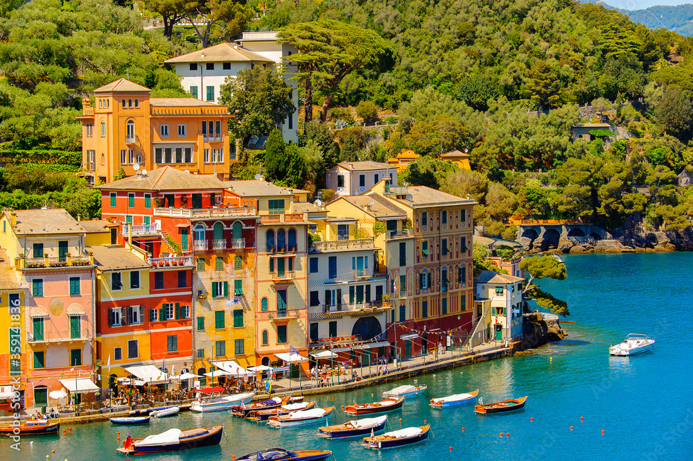 It's Close view of the colorful houses in Portofino, an Italian fishing village, Genoa province, Italy. A vacation resort with a picturesque harbour and with celebrity and artistic visitors.