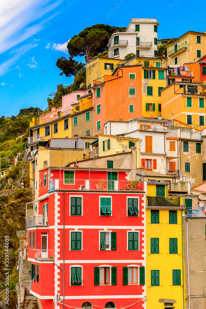 It's Beautiful view of Riomaggiore (Rimazuu), a village in province of La Spezia, Liguria, Italy. It's one of the lands of Cinque Terre, UNESCO World Heritage Site