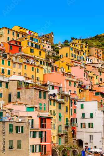 It's Beautiful view of Riomaggiore (Rimazuu), a village in province of La Spezia, Liguria, Italy. It's one of the lands of Cinque Terre, UNESCO World Heritage Site