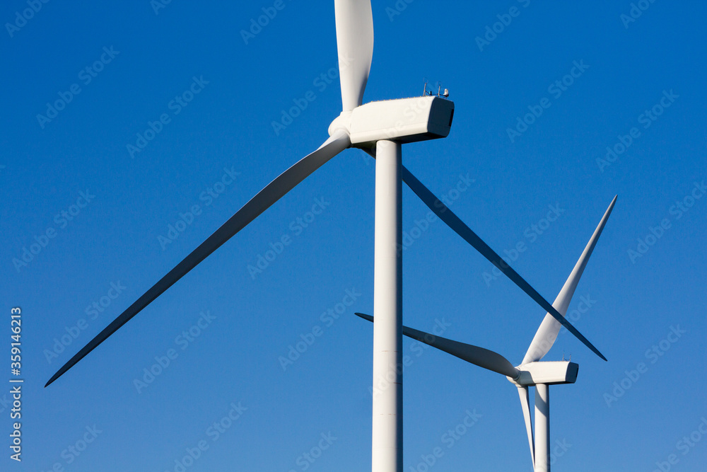 Pico Gallo, Tineo, Asturias. Back view of blades, rotor hub and nacelle of a wind mill. Pico Gallo, Tineo, Asturias. Back view of blades, rotor hub and nacelle of a wind mill.