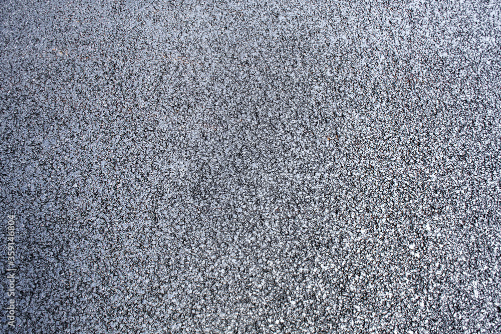 freshly laid asphalt on a new road freshly laid asphalt on a new road