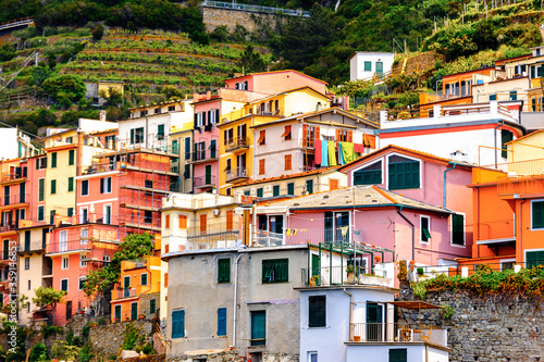 It's Houses on the mountains of Manarola (Manaea), a small town in province of La Spezia, Liguria, Italy. It's one of the lands of Cinque Terre, UNESCO World Heritage Site