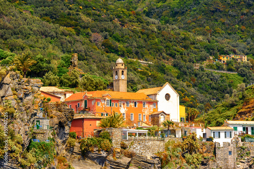 It's Houses on the mountains of Manarola (Manaea), a small town in province of La Spezia, Liguria, Italy. It's one of the lands of Cinque Terre, UNESCO World Heritage Site photo