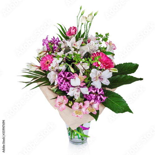 Beautiful bouquet of bright flowers in vase isolated on white