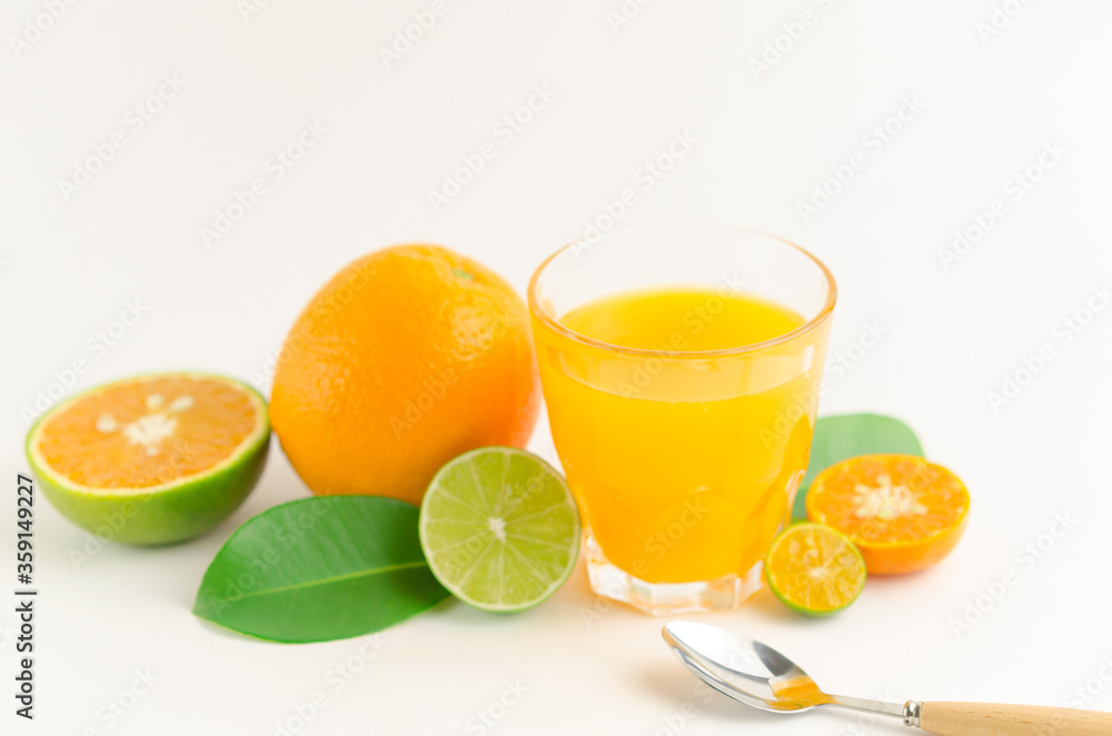 Citrus juice with many kinds of citrus fruits behind. Healthy and diet concept Citrus juice with many kinds of citrus fruits behind. Healthy and diet concept