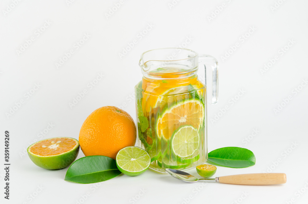 Fototapeta premium Bottle of detox water made from citrus fruits. Concept for dieting