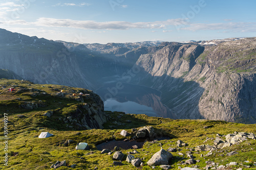 Campsite on hill between the way to Trolltunga cliff in Odda western of Norway in summer season, Scandinavia