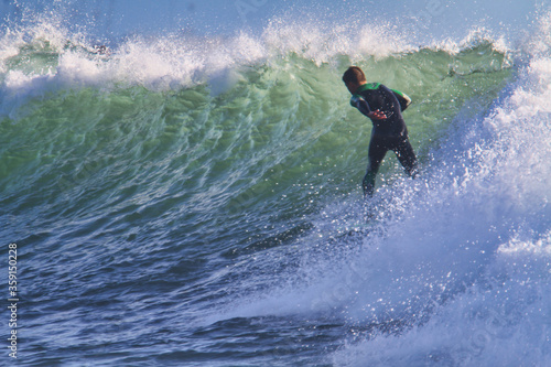 A day at the beach surfing Rincon California