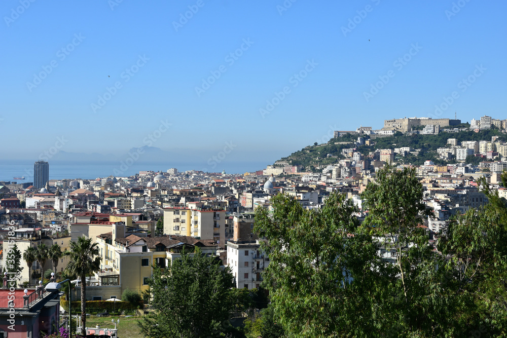 Panoramic view of the city of Naples from the Capodimonte park, Italy.