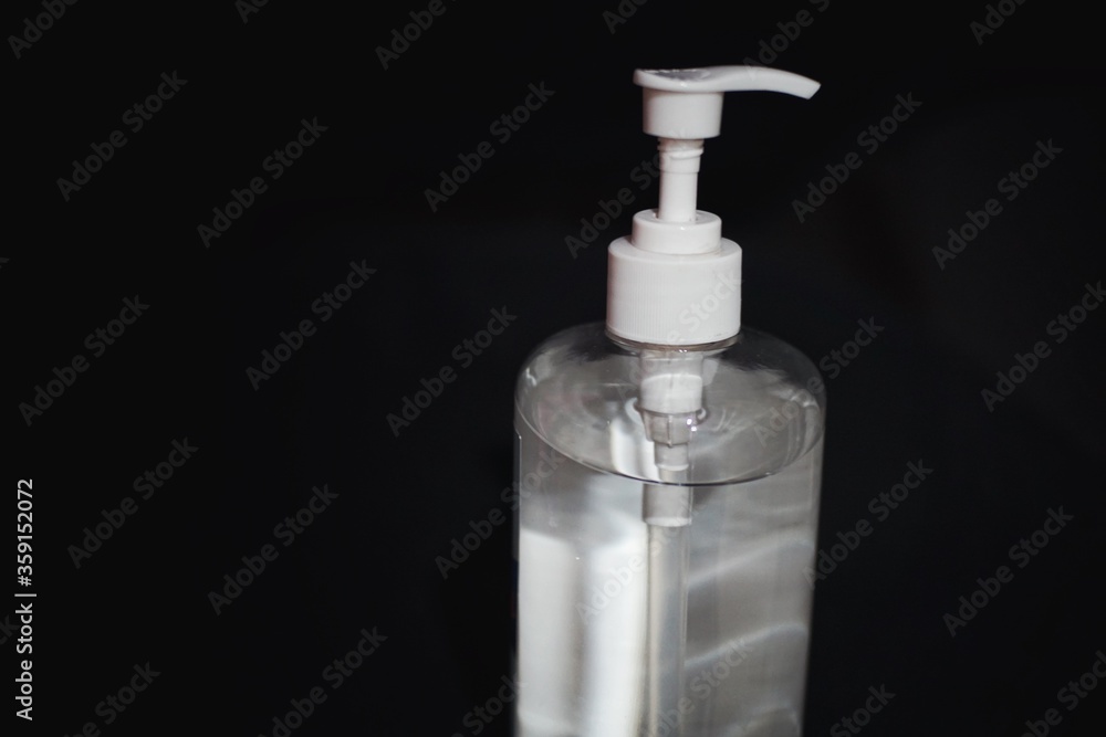 Hand sanitizer bottle with black background. Hand sanitizer bottle with black background.