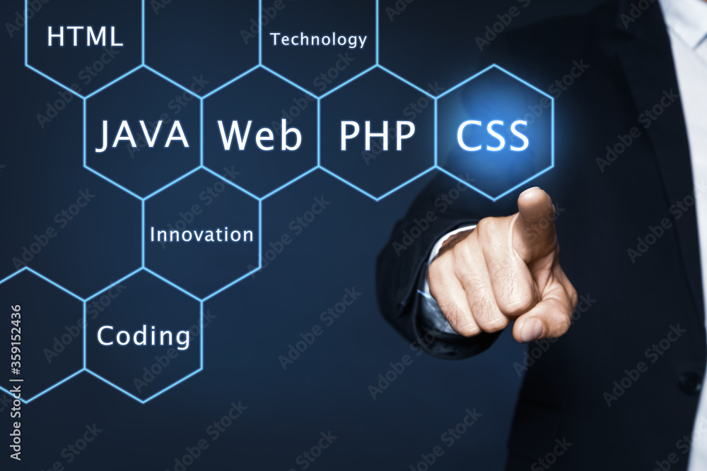 Businessman pointing at virtual screen with different words, closeup. Programming and coding Businessman pointing at virtual screen with different words, closeup. Programming and coding