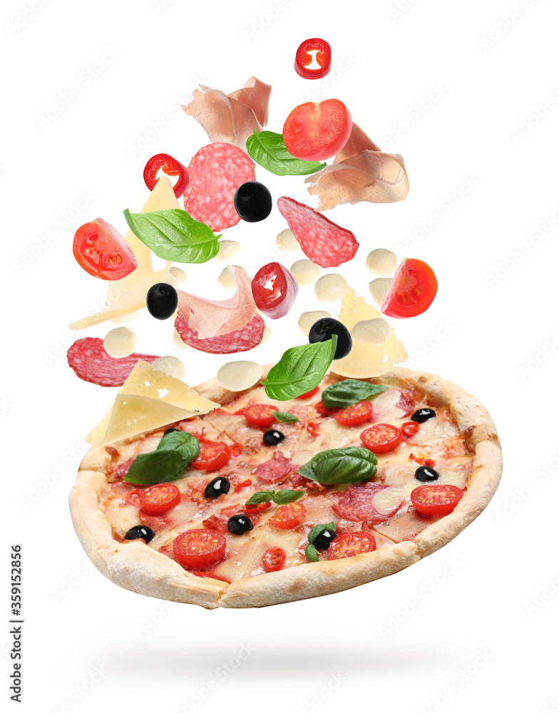 Delicious pizza with flying ingredients on white background Delicious pizza with flying ingredients on white background