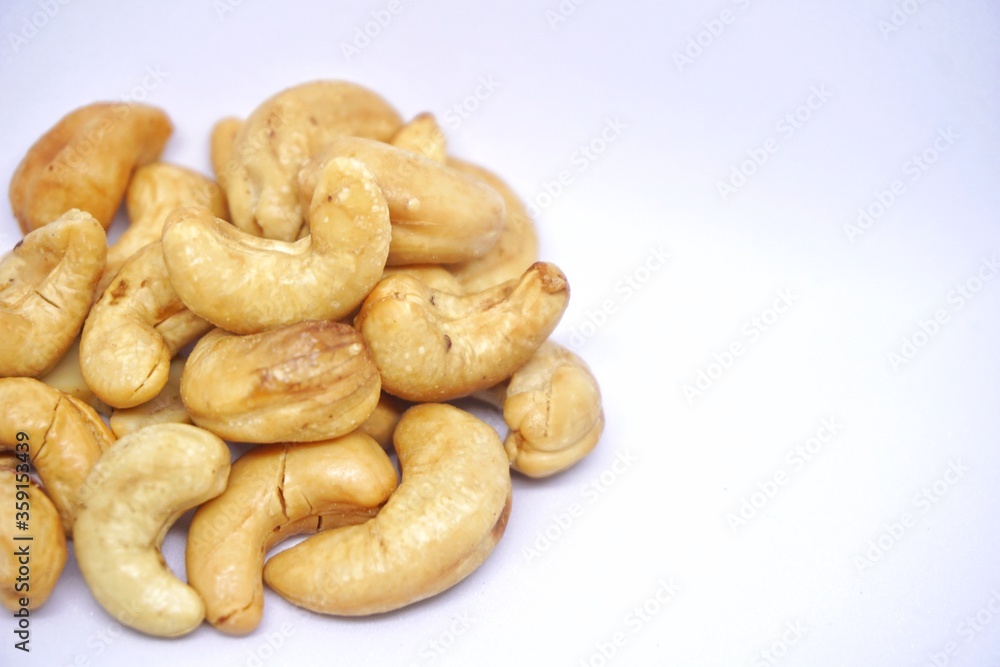Close up of cashew nuts with white backgorund.