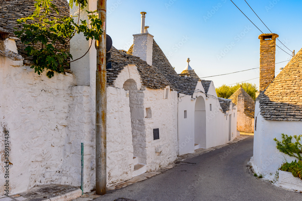 It's Typical trulli houses of Alberobello, a small town in Apulia, Italy. The Trulli of Alberobello have are a UNESCO World Heritage site since 1996