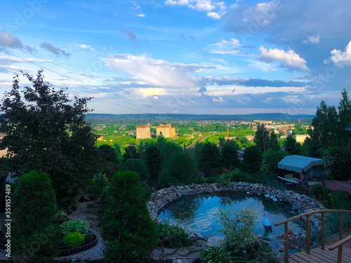 pond overlaid with stone against the sky in the afternoon
