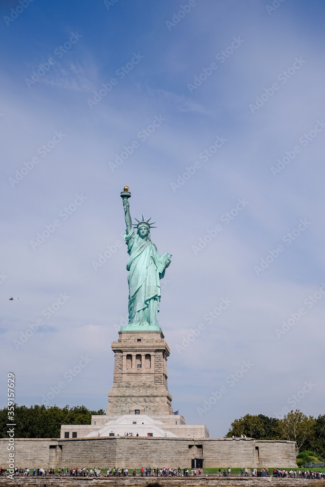 The Statue of Liberty at Liberty Island in New York City on a sunny day