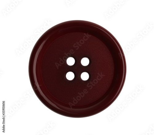 Brown plastic sewing button isolated on white