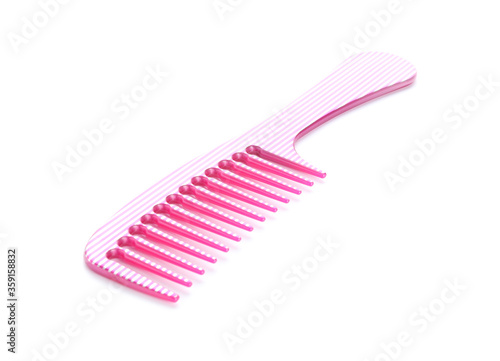 New pink hair comb isolated on white