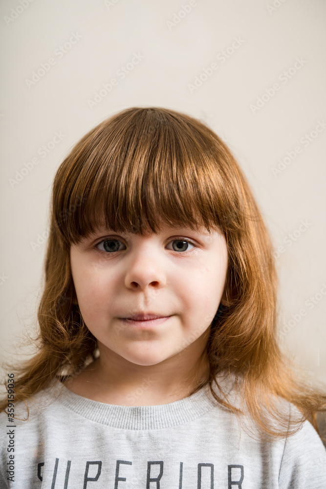 Portrait of cute little girl at home. Selective focus. Portrait of cute little girl at home. Selective focus.