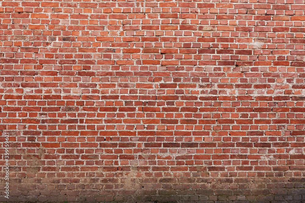 Naklejka premium Red brick wall, close up