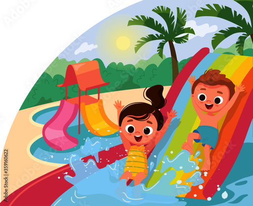 Children ride the slide in aqua park. Children swimming. Kids having fun.