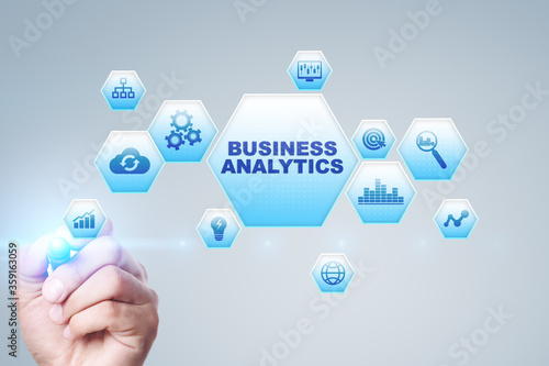 Business analytics concept on the virtual screen. photo