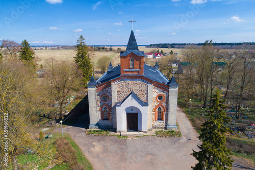 Old Church of St. John closeup on a sunny May day (quadrocopter shot). Gubanitsy, Leningrad region. Russia