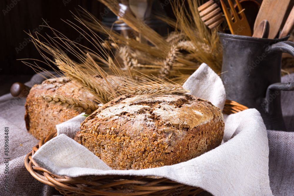 Delicious and healthy homemade wholemeal bread - obrazy, fototapety, plakaty 