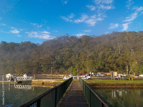 Wallpaper Mural Beautiful morning view of Apple Tree Creek with reflection of blue sky, mountains and trees, Ku-ring-gai Chase National Park, New South Wales, Australia Torontodigital.ca