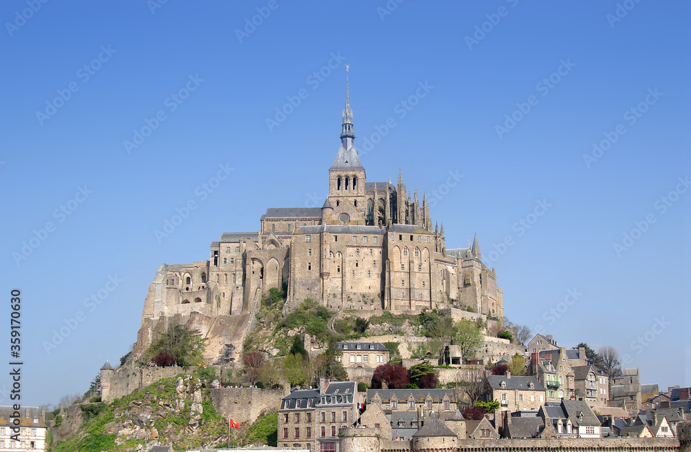 Mont St Michel, or Sanit Michael's Mount, Brittany, France. Historic medieval walled city that is cut off from the mainland at high tide. 