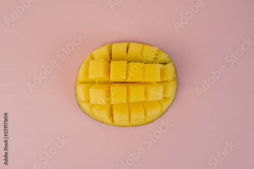 Flat Lay of Mango Lying on the Pink Background Table