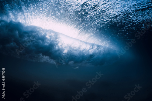 Ocean wave with vortex in underwater. Underwater view