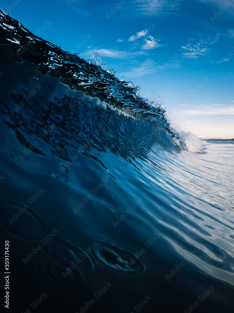 Blue wave in ocean. Breaking sea wave