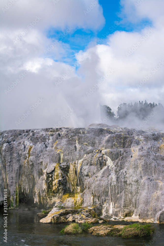 Natural forces in play as geysers erupt high above sulphur covered rocks Natural forces in play as geysers erupt high above sulphur covered rocks