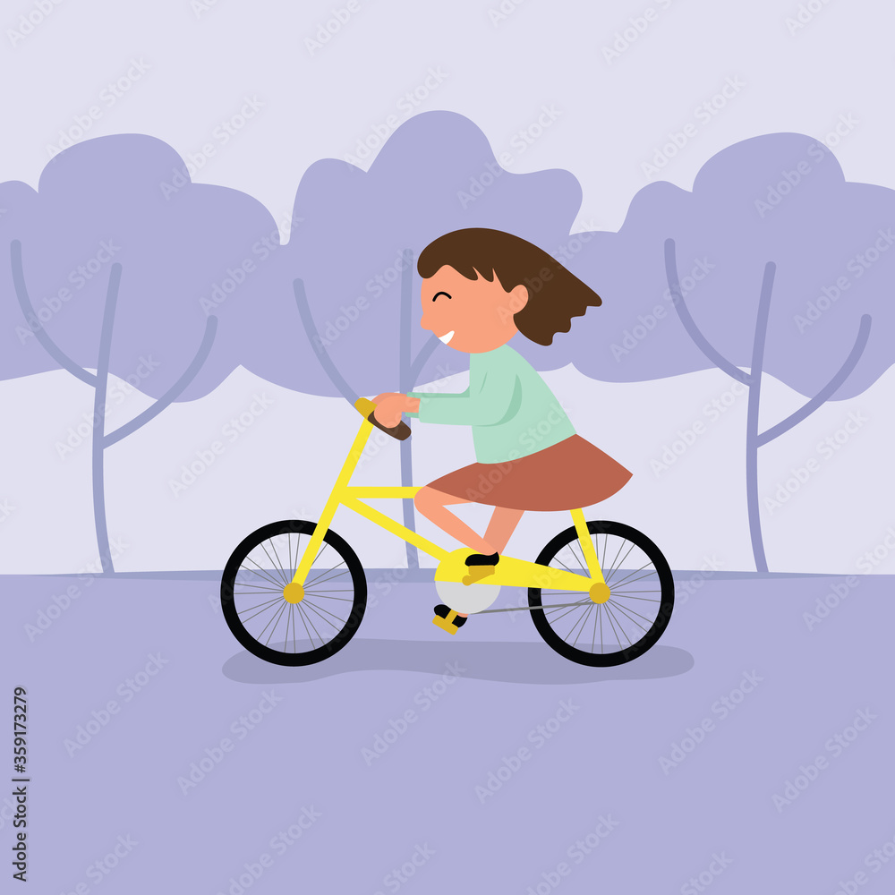 child riding a bike with happy face