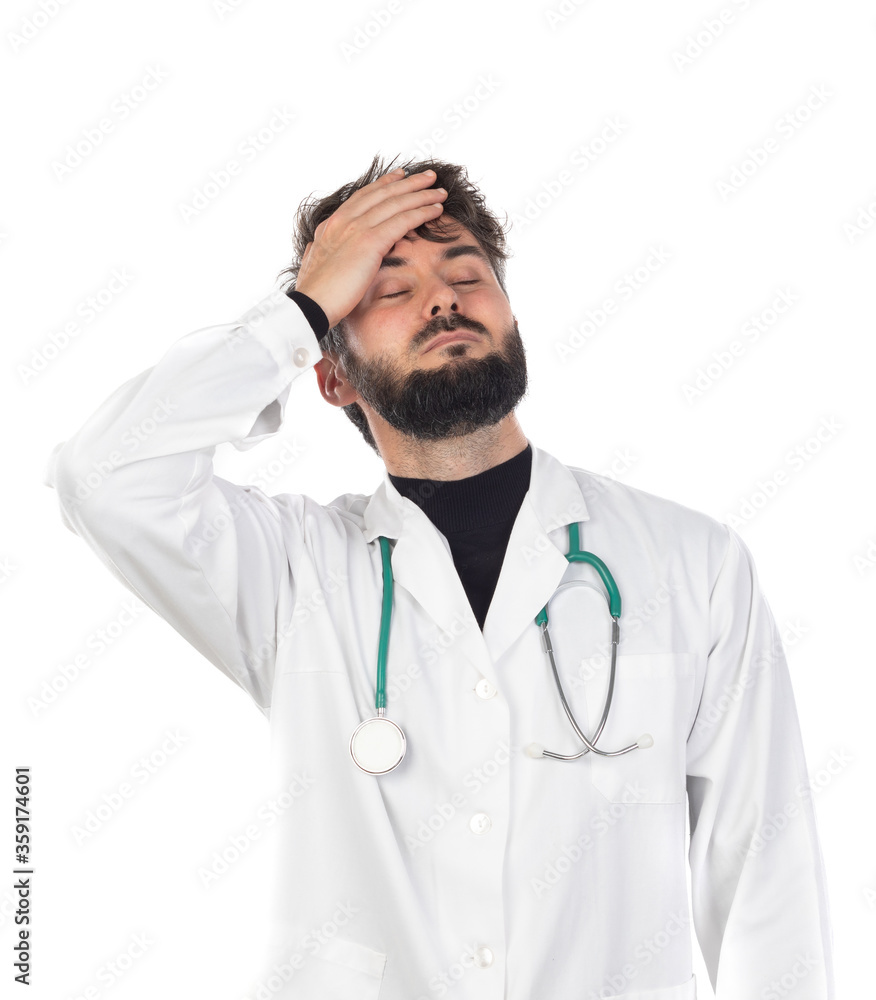 Young doctor with beard wearing a medical gown Young doctor with beard wearing a medical gown