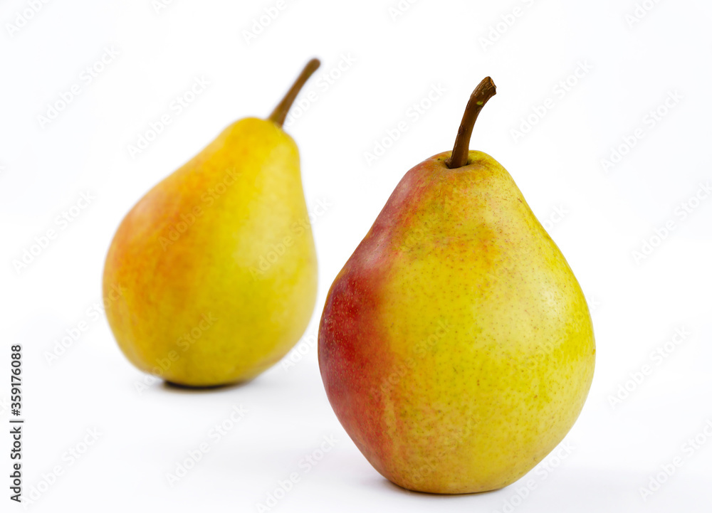 pear fruit, yellow fruits with red sides on a light background pear fruit, yellow fruits with red sides on a light background