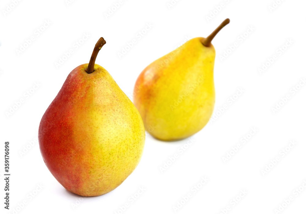 pear fruit, yellow fruits with red sides on a light background pear fruit, yellow fruits with red sides on a light background