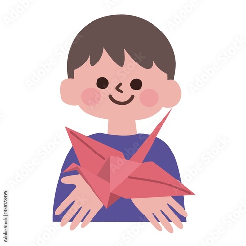 赤い折り鶴を差し出す男の子