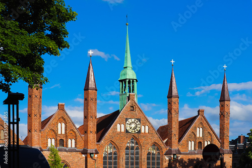 Heiligen Geist Hospital. Facade of the Historic Holy Spirit Hospital in Lubeck, Germany. One of the oldest hospitals in the world