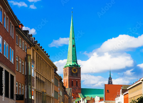 Lubeck, Germany, old city, downtown. Breite street, Evangelical church in the background