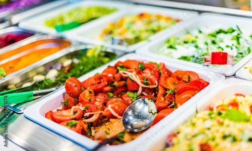 Assortment of fresh vegetable salads in restaurant buffet