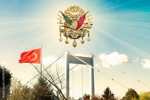  Sun in the blue sky and the emblem of the Ottoman Empire on. The Arabic writing on the coat of arms 